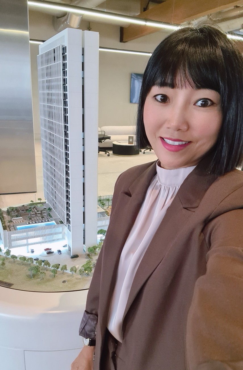 Ellen with a Dubai property model